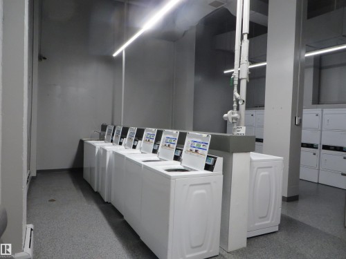 911 10883 Saskatchewan Drive, Edmonton, AB - Indoor Photo Showing Laundry Room