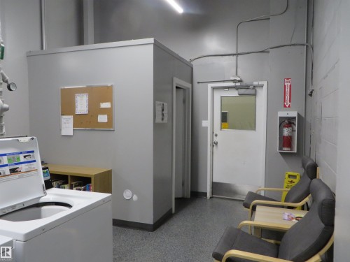 911 10883 Saskatchewan Drive, Edmonton, AB - Indoor Photo Showing Laundry Room