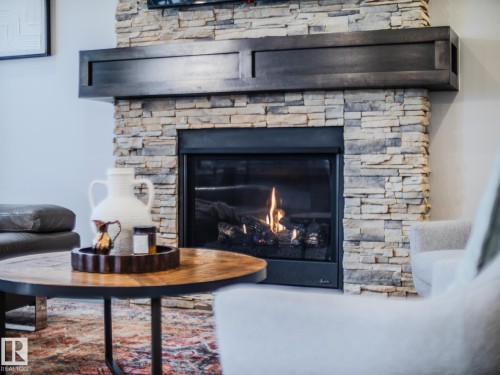 2611 Blue Jay Close, Edmonton, AB - Indoor Photo Showing Living Room With Fireplace