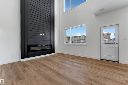 207 Basin Court, Leduc, AB - Indoor With Fireplace