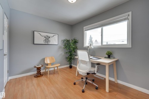 Home office featuring baseboards and light wood-style floors - 13932 118 Avenue, Edmonton, AB - Indoor Photo Showing Office