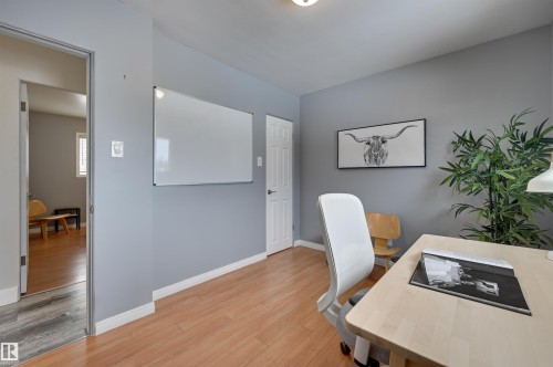 Office area with light wood-type flooring and baseboards - 13932 118 Avenue, Edmonton, AB - Indoor Photo Showing Office