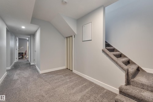Corridor featuring an office area, light carpet, stairway, and recessed lighting - 13932 118 Avenue, Edmonton, AB - Indoor Photo Showing Other Room