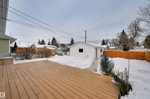 Snow covered deck with an outdoor structure - 13932 118 Avenue, Edmonton, AB - Outdoor With Deck Patio Veranda