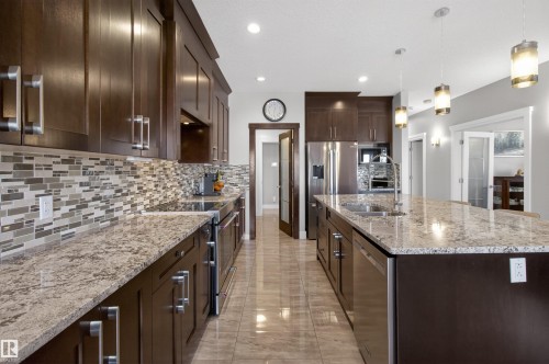 207 Bremner Crescent, Fort Saskatchewan, AB - Indoor Photo Showing Kitchen With Double Sink With Upgraded Kitchen