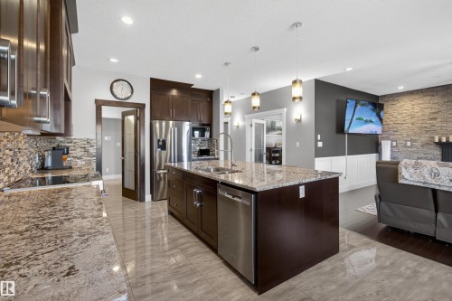 207 Bremner Crescent, Fort Saskatchewan, AB - Indoor Photo Showing Kitchen With Double Sink With Upgraded Kitchen