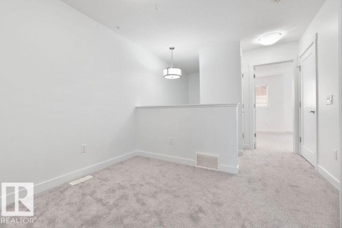 221 Cy Becker Blvd, Edmonton, AB - Indoor Photo Showing Other Room