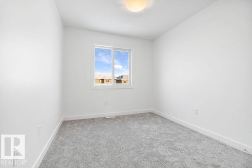 221 Cy Becker Blvd, Edmonton, AB - Indoor Photo Showing Other Room