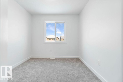 221 Cy Becker Blvd, Edmonton, AB - Indoor Photo Showing Other Room