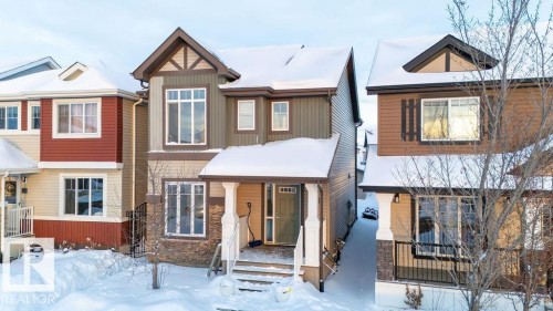 221 Cy Becker Blvd, Edmonton, AB - Outdoor With Facade