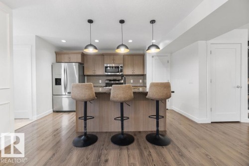 221 Cy Becker Blvd, Edmonton, AB - Indoor Photo Showing Kitchen With Upgraded Kitchen