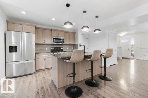 221 Cy Becker Blvd, Edmonton, AB - Indoor Photo Showing Kitchen With Upgraded Kitchen