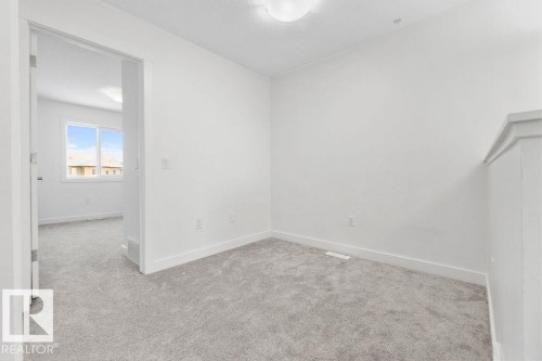 221 Cy Becker Blvd, Edmonton, AB - Indoor Photo Showing Other Room