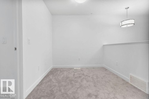 221 Cy Becker Blvd, Edmonton, AB - Indoor Photo Showing Other Room