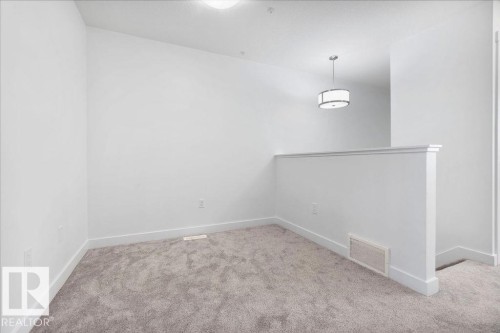 221 Cy Becker Blvd, Edmonton, AB - Indoor Photo Showing Other Room