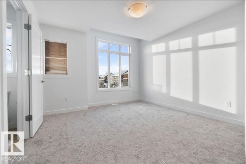 221 Cy Becker Blvd, Edmonton, AB - Indoor Photo Showing Other Room