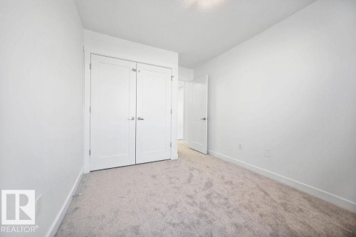 221 Cy Becker Blvd, Edmonton, AB - Indoor Photo Showing Other Room
