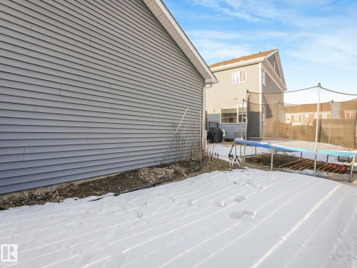 The property features grey horizontal siding - 1920 24 Street, Edmonton, AB - Outdoor