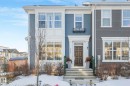 The property features a dark-paneled front door, white trim, and a window box - 1920 24 Street, Edmonton, AB  - Outdoor With Facade 