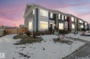 The property features a multi-story exterior with siding and multiple windows, providing ample natural light - 1920 24 Street, Edmonton, AB  - Outdoor 