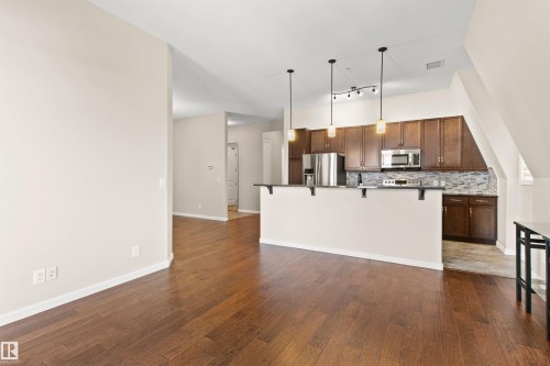425 6083 Maynard Way, Edmonton, AB - Indoor Photo Showing Kitchen With Upgraded Kitchen