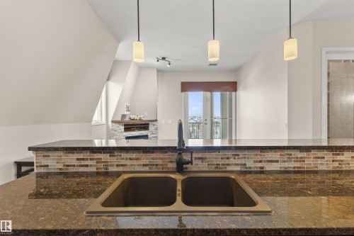 425 6083 Maynard Way, Edmonton, AB - Indoor Photo Showing Kitchen With Double Sink