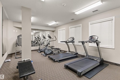 425 6083 Maynard Way, Edmonton, AB - Indoor Photo Showing Gym Room