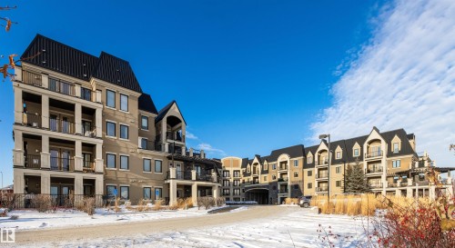 425 6083 Maynard Way, Edmonton, AB - Outdoor With Balcony With Facade