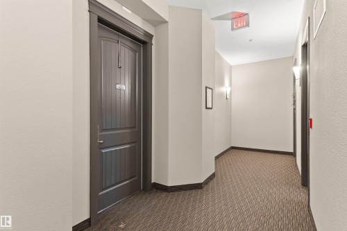 425 6083 Maynard Way, Edmonton, AB - Indoor Photo Showing Other Room