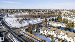 Snowy aerial view with a residential view - 