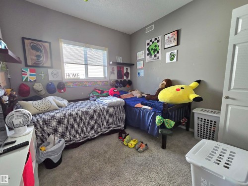 24 6520 2 Avenue Sw, Edmonton, AB - Indoor Photo Showing Bedroom
