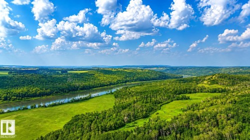 Expansive landscape featuring a meandering river, lush green fields, and dense forest - Rge Rd 102 Twp Rd 552A, Rural St. Paul County, AB 