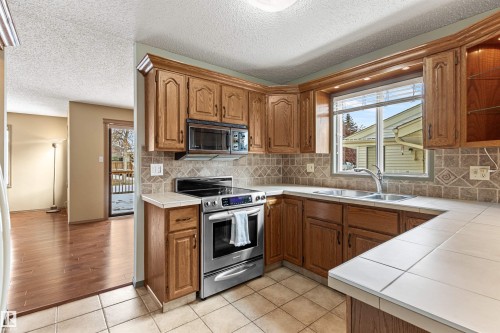 205 Oeming Road, Edmonton, AB - Indoor Photo Showing Kitchen With Double Sink