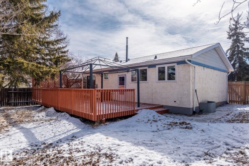 The property features a spacious rear deck with a gazebo frame, providing an inviting outdoor area - 18124 68Ave, Edmonton, AB - Outdoor With Deck Patio Veranda
