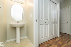 Bathroom featuring baseboards and a closet - 