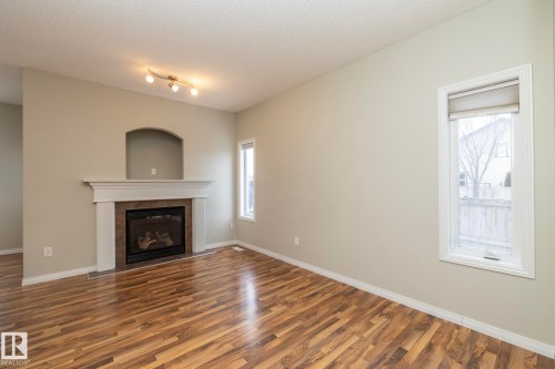 1897 Rutherford Road, Edmonton, AB - Indoor Photo Showing Living Room With Fireplace