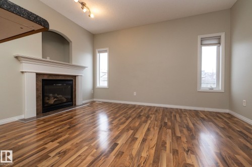 1897 Rutherford Road, Edmonton, AB - Indoor Photo Showing Living Room With Fireplace