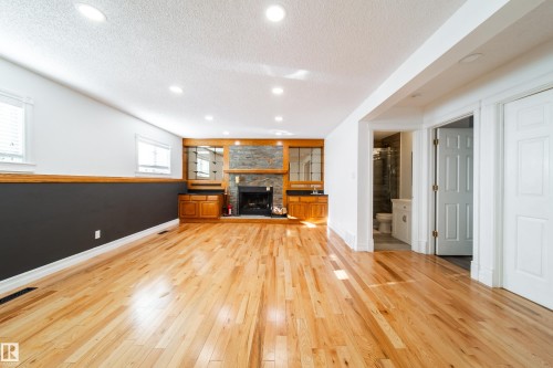 18007 57 Avenue, Edmonton, AB - Indoor Photo Showing Living Room With Fireplace