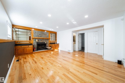 18007 57 Avenue, Edmonton, AB - Indoor Photo Showing Living Room With Fireplace
