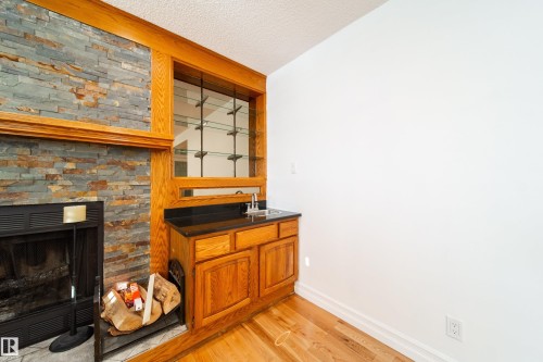 18007 57 Avenue, Edmonton, AB - Indoor With Fireplace