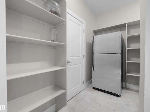 View of storage area - 59 10550 Ellerslie Road, Edmonton, AB - Indoor With Storage