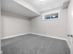 Bonus room with carpet floors and baseboards - 