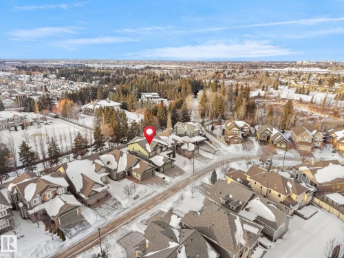 Snowy aerial view with a residential view - 59 10550 Ellerslie Road, Edmonton, AB - Outdoor With View