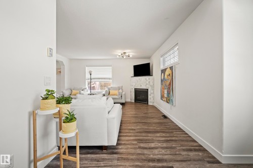 8318 Shaske Crescent, Edmonton, AB - Indoor Photo Showing Other Room With Fireplace