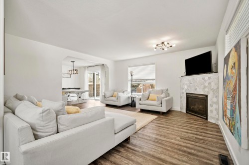 8318 Shaske Crescent, Edmonton, AB - Indoor Photo Showing Living Room With Fireplace
