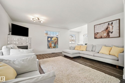 8318 Shaske Crescent, Edmonton, AB - Indoor Photo Showing Living Room With Fireplace