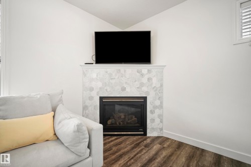 8318 Shaske Crescent, Edmonton, AB - Indoor Photo Showing Living Room With Fireplace
