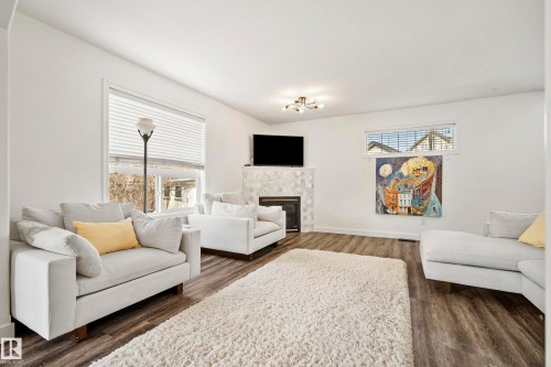 8318 Shaske Crescent, Edmonton, AB - Indoor Photo Showing Living Room With Fireplace