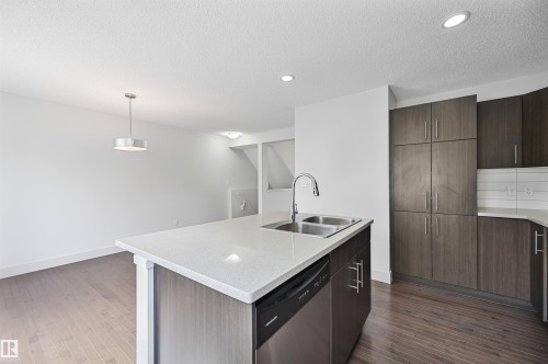 35 2922 Maple Way, Edmonton, AB - Indoor Photo Showing Kitchen With Double Sink