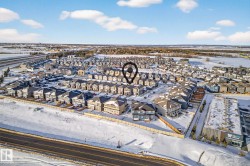 Snowy aerial view with a residential view - 